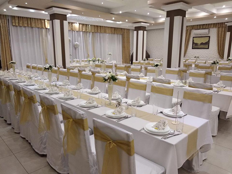 Grand table setting with golden cutlery